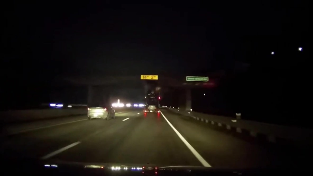 Car hauler hits overpass in Ann Arbor